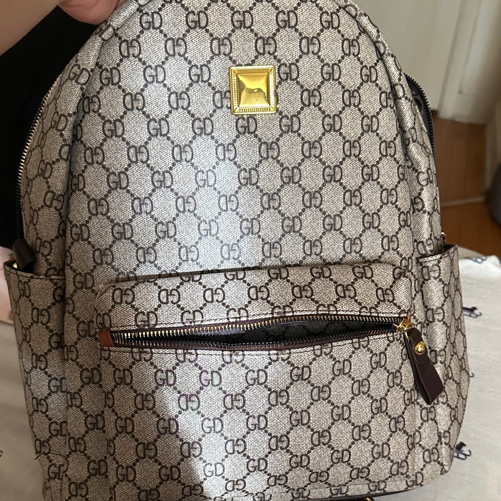 Monogram Pattern Backpack with Gold Accent